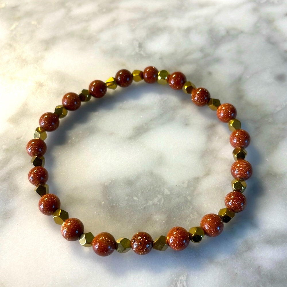 Sunstone & gold hematite bracelet in size 7”